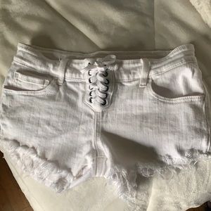 White denim Daytrip Gemini cut off shorts